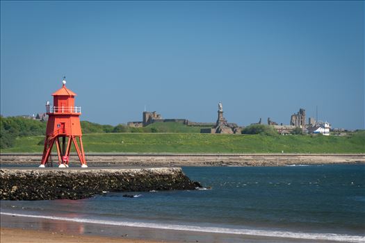 Herd Groyne Lighthouse, South Shields - Built 1882 from corrugated iron painted red.  On the gallery a fog bell sounds every 10 seconds. If on course show white, too far left shows red and too far right shows green.