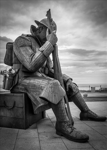 'Tommy' aka 1101 - The steel statue weighs 1.2 tonnes, and is 9 feet 5 inches tall. Depicting a WW1 soldier, wearing full uniform, sitting on an ammunition box. Referring to Archetype Tommy Atkins. '1101' refers to the 1st minute of peace in 1918.